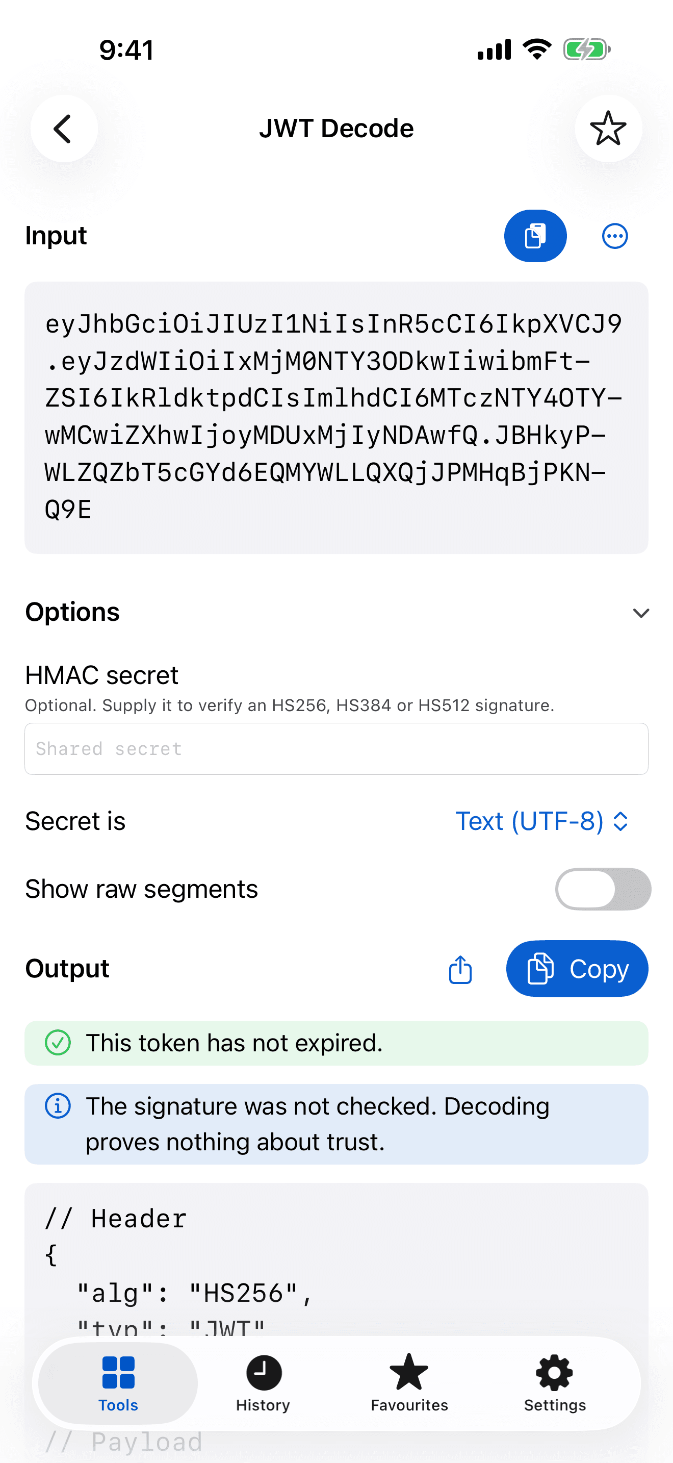 JWT Decode on iPhone: a token with its options, and notes saying the token has not expired and its signature was not checked.