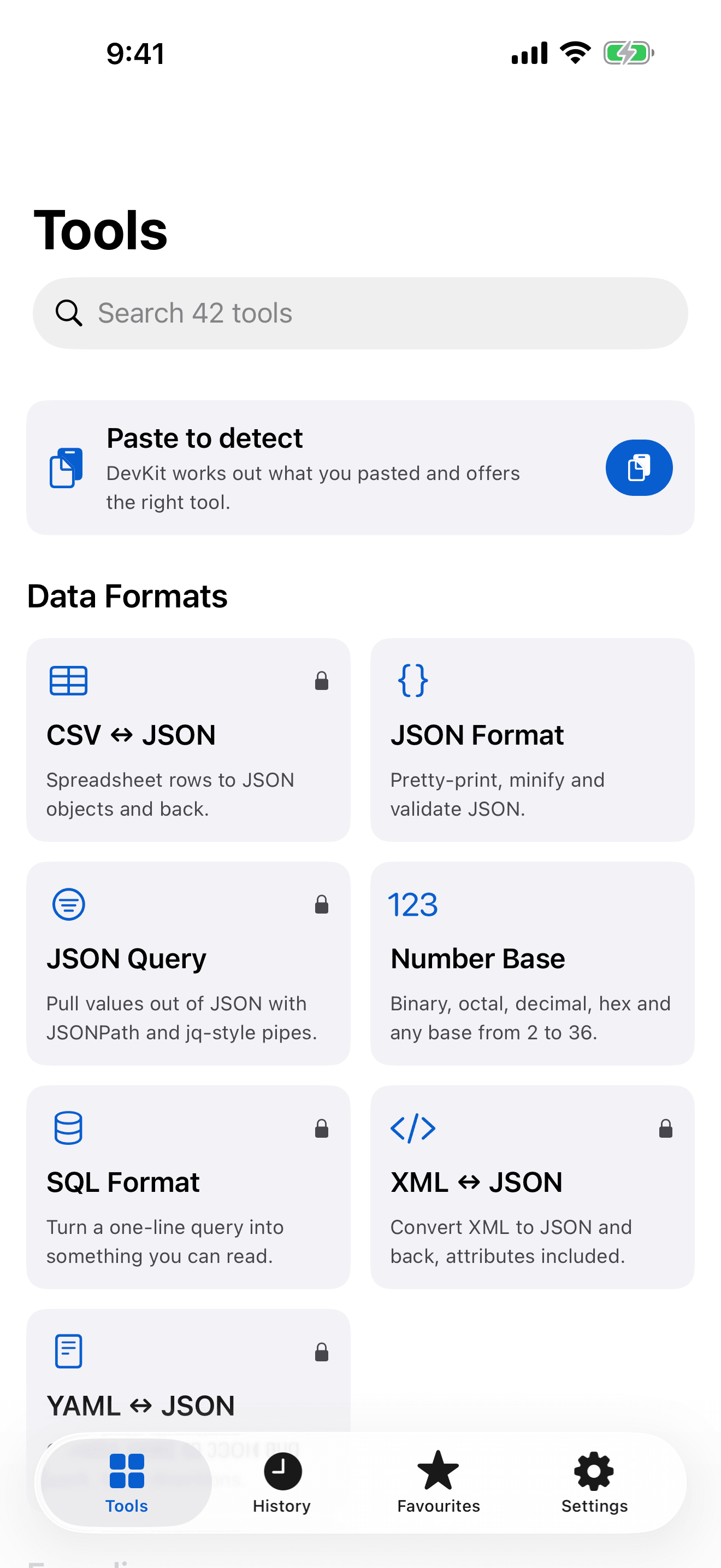 DevKit on iPhone: the Tools screen, with search across 42 tools, the Paste to detect banner and the Data Formats tools.